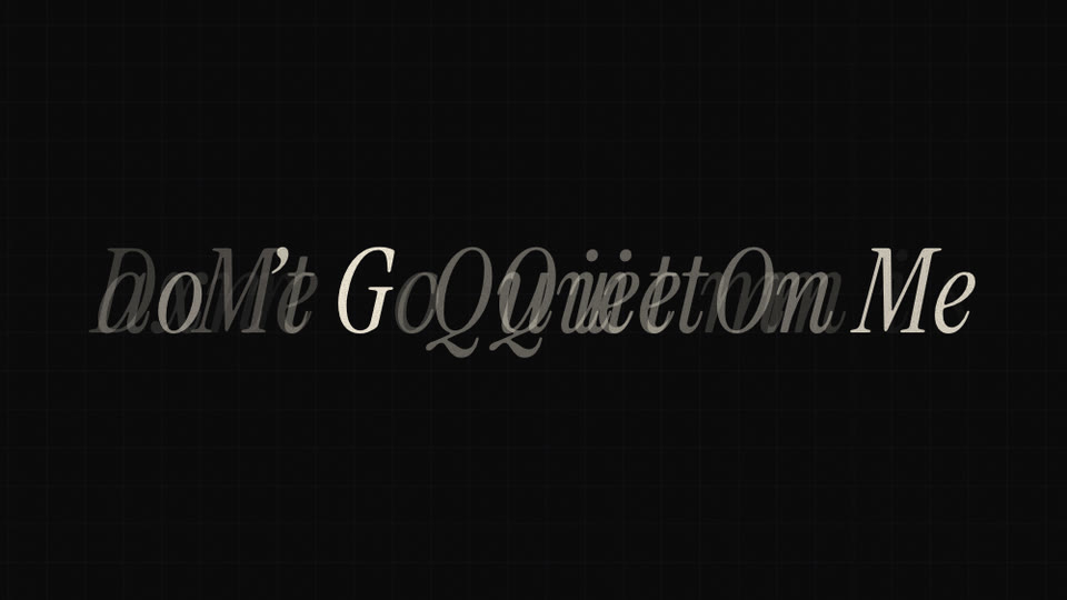 Title letters half-resolved from noise, Quiet smeared into doubled ghost letters