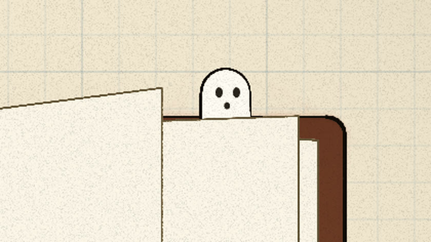 A small ghost peeks over the top of a blank dictionary page