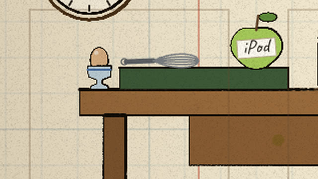 A boiled egg in an egg cup and a whisk on her desk